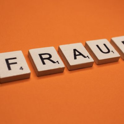 fraud-scrabble-letters-word-on-a-orange-background-2021-08-30-14-06-14-utc